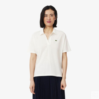 Женское поло Lacoste